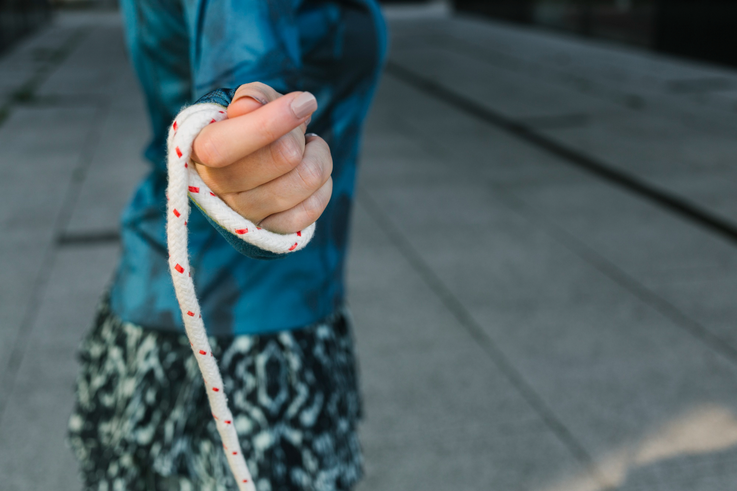 side-view-woman-holding-jump-rope